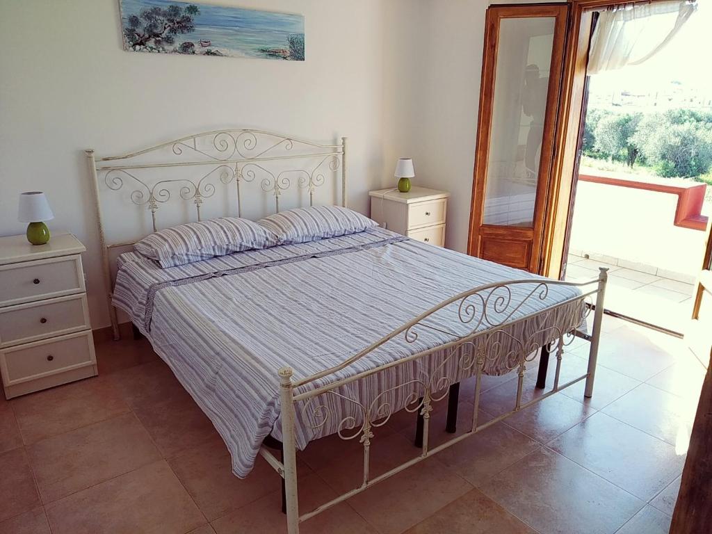 Postel nebo postele na pokoji v ubytování B Come Bianca