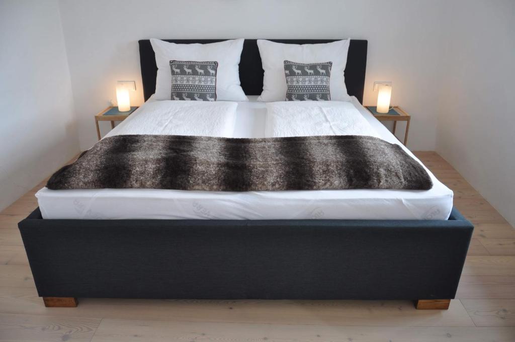 Ένα ή περισσότερα κρεβάτια σε δωμάτιο στο Herrenhaus am Grübl