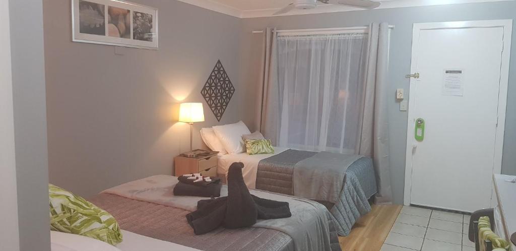 Postel nebo postele na pokoji v ubytování Limassol Motel