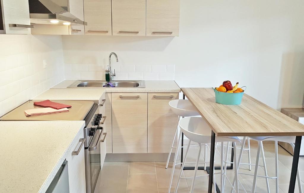 Kuchyňa alebo kuchynka v ubytovaní CELENI APARTMENTS