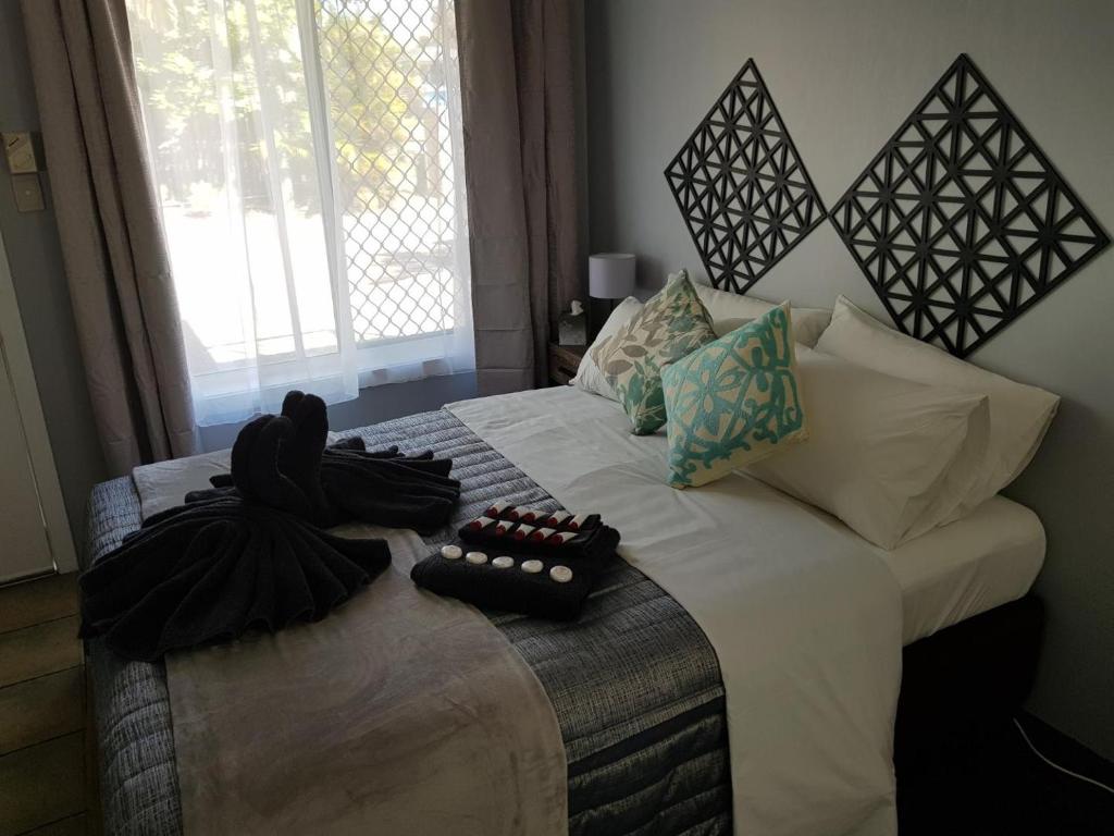 Postel nebo postele na pokoji v ubytování Limassol Motel