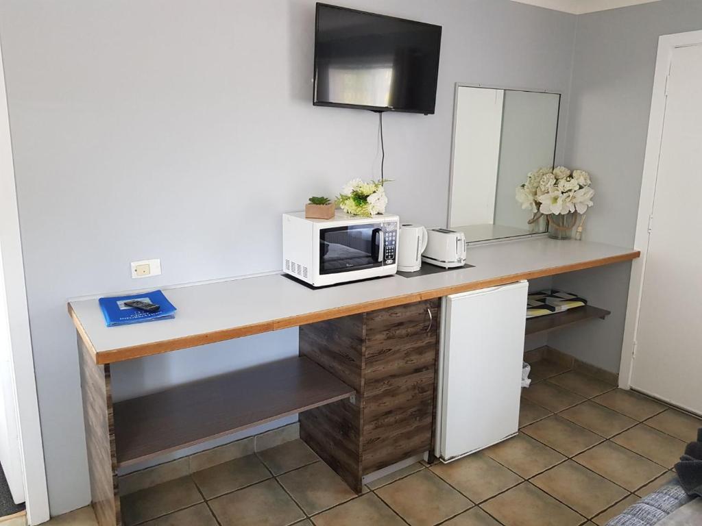 Kuchyň nebo kuchyňský kout v ubytování Limassol Motel