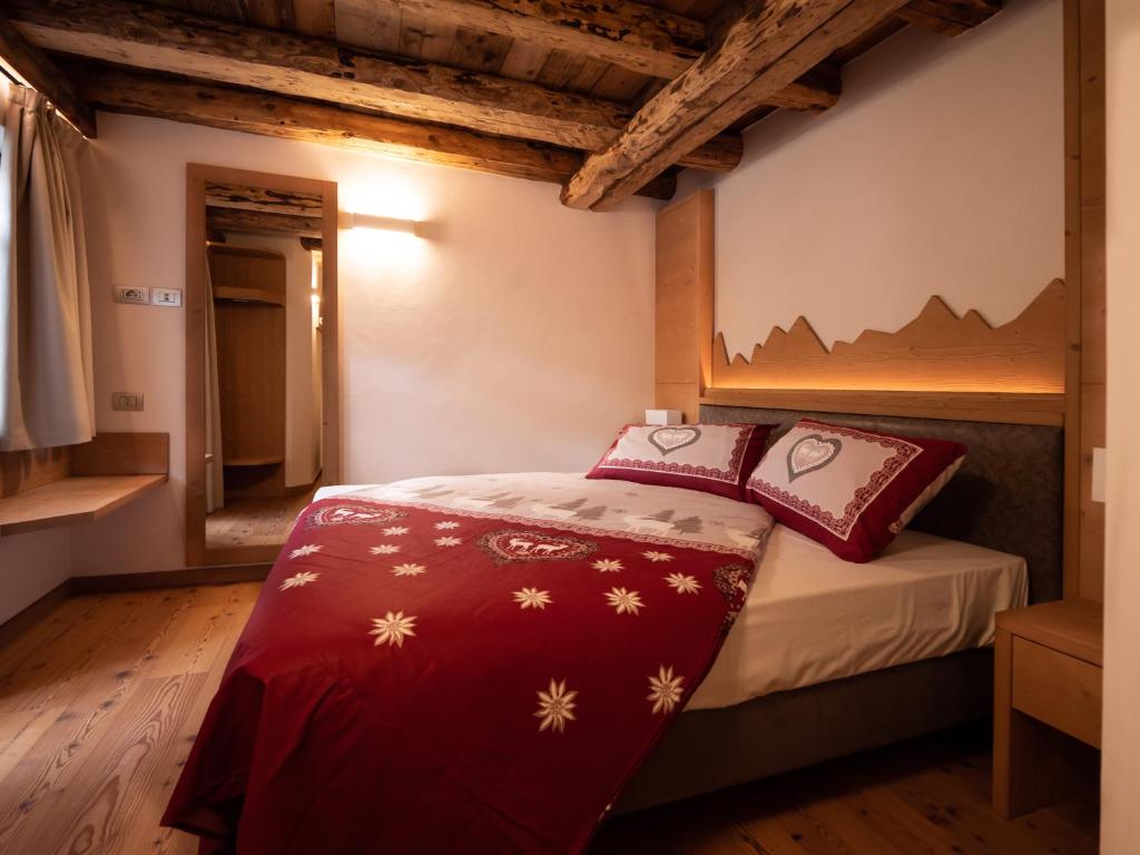 Postel nebo postele na pokoji v ubytování Stella Alpina Suite