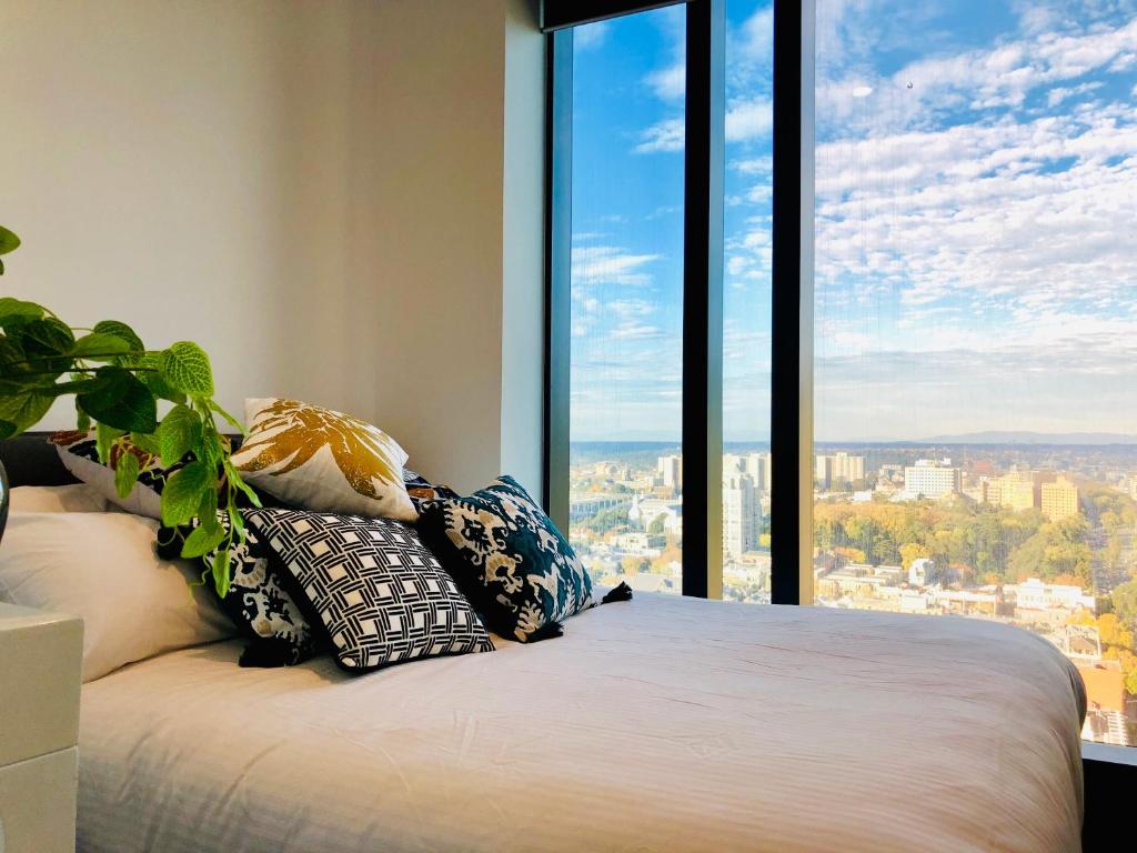 Cama ou camas em um quarto em 2BR APT in Melbourne CBD / Melbourne Uni / RMIT