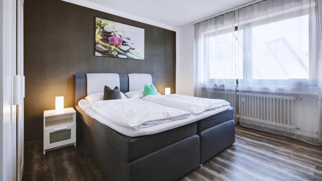 Ένα ή περισσότερα κρεβάτια σε δωμάτιο στο Hotel Restaurant Austüble