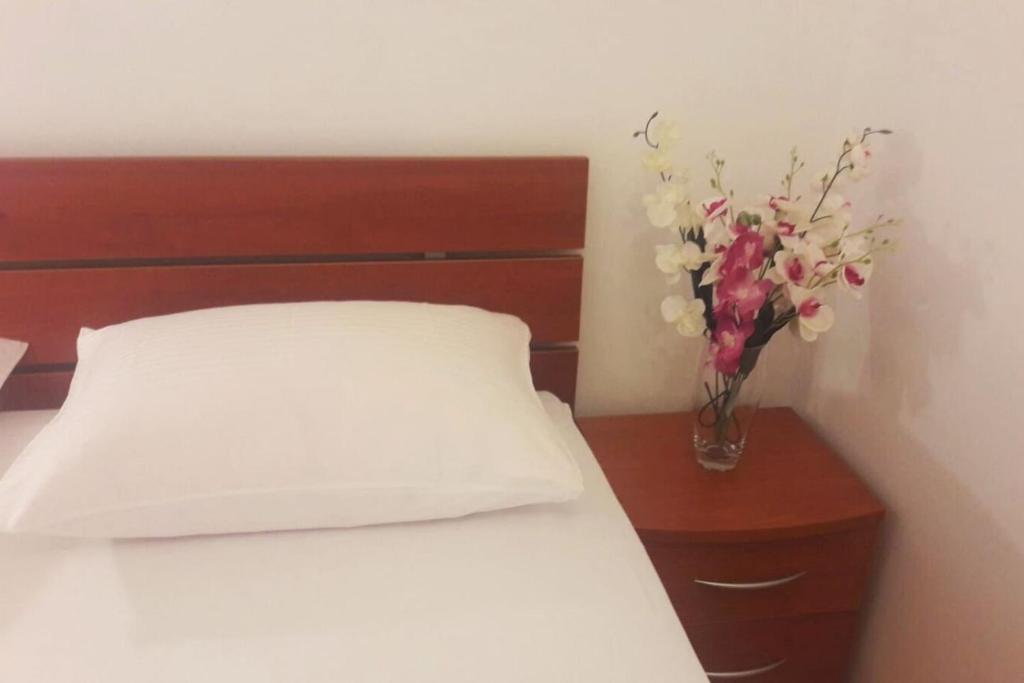 Łóżko lub łóżka w pokoju w obiekcie Apartment Jela