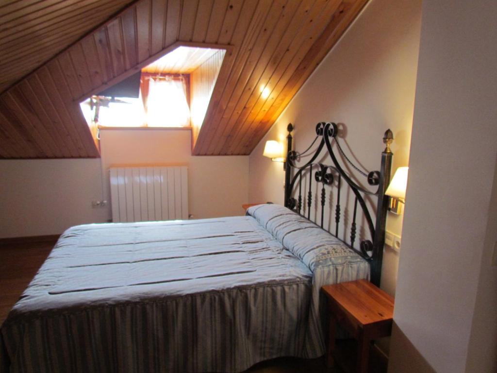 Postel nebo postele na pokoji v ubytování Hotel Las Nieves