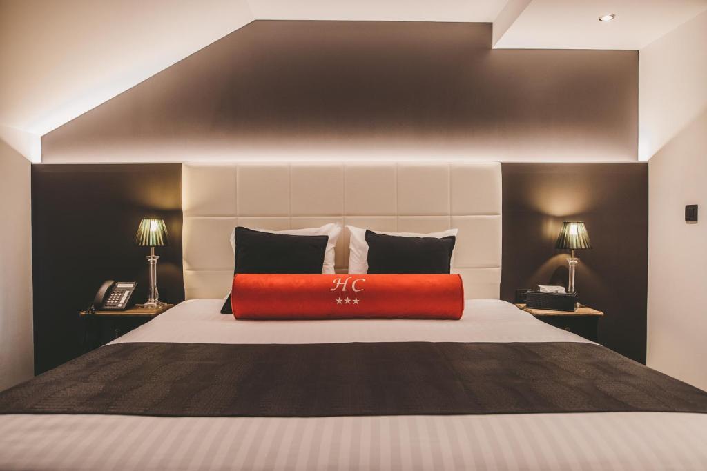 Postel nebo postele na pokoji v ubytování Hôtel Hors-Château - Liège Centre Historique