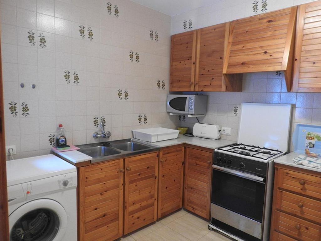 Kuchyň nebo kuchyňský kout v ubytování Apartamentos Jardin Playa