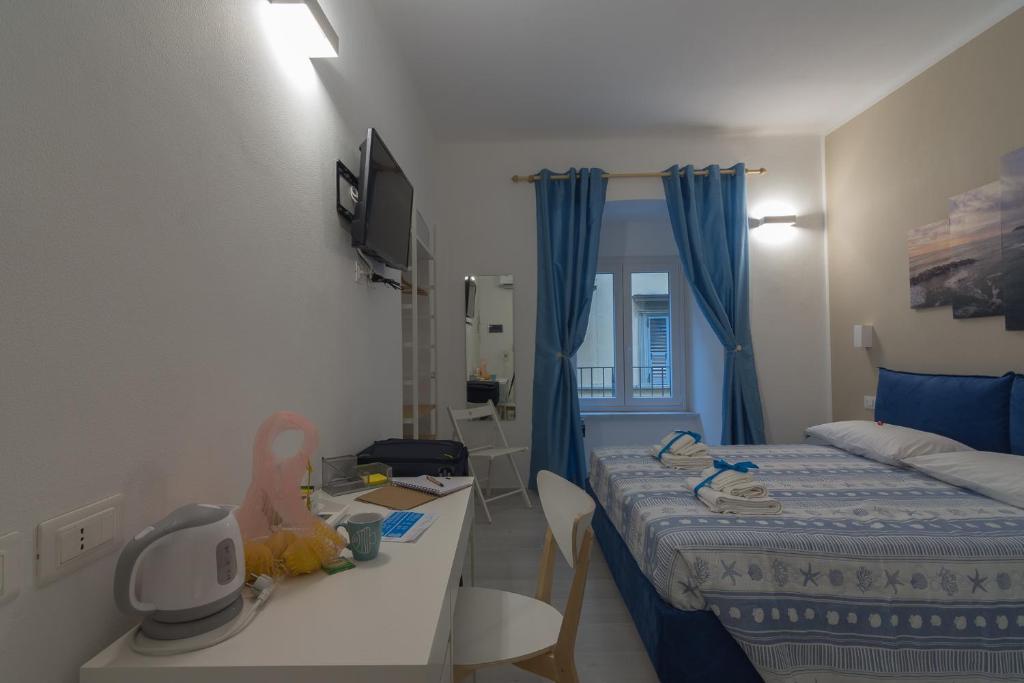 Postel nebo postele na pokoji v ubytování Ca' da Sirio