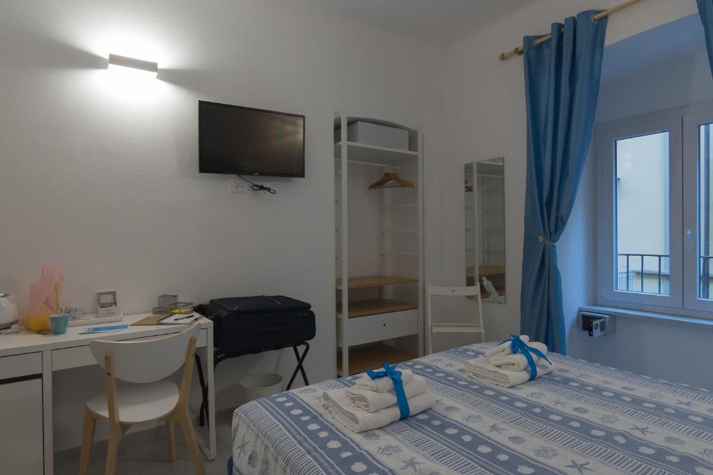 Postel nebo postele na pokoji v ubytování Ca' da Sirio