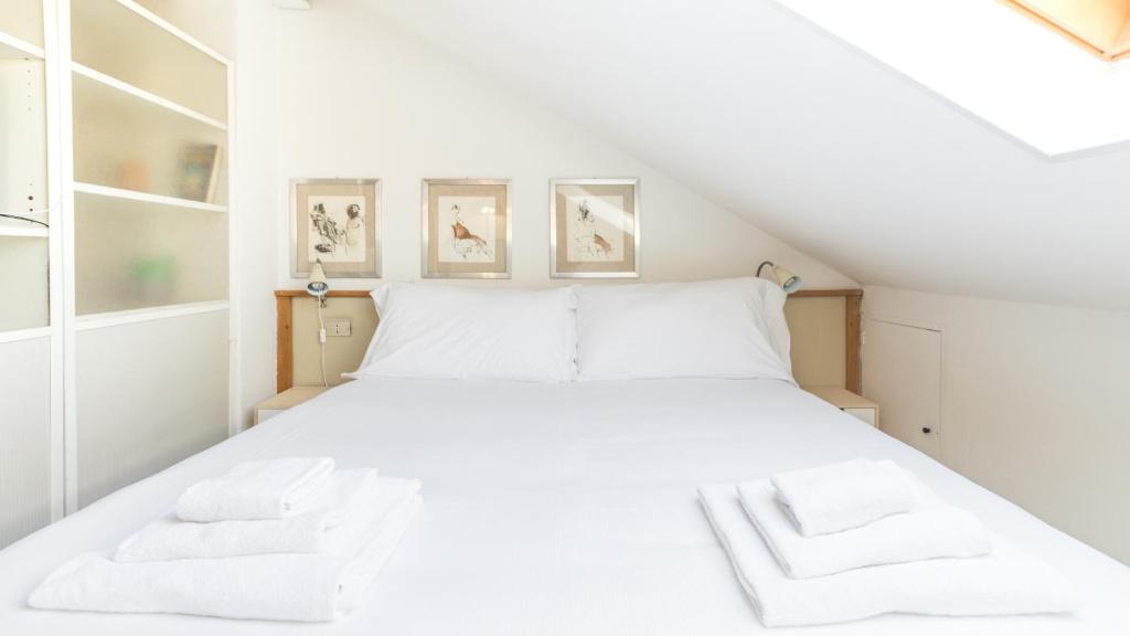 A bed or beds in a room at Italianway - Washington 91