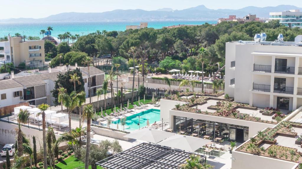 an aerial view of a resort with a pool at Hotel Paradiso Garden in Playa de Palma