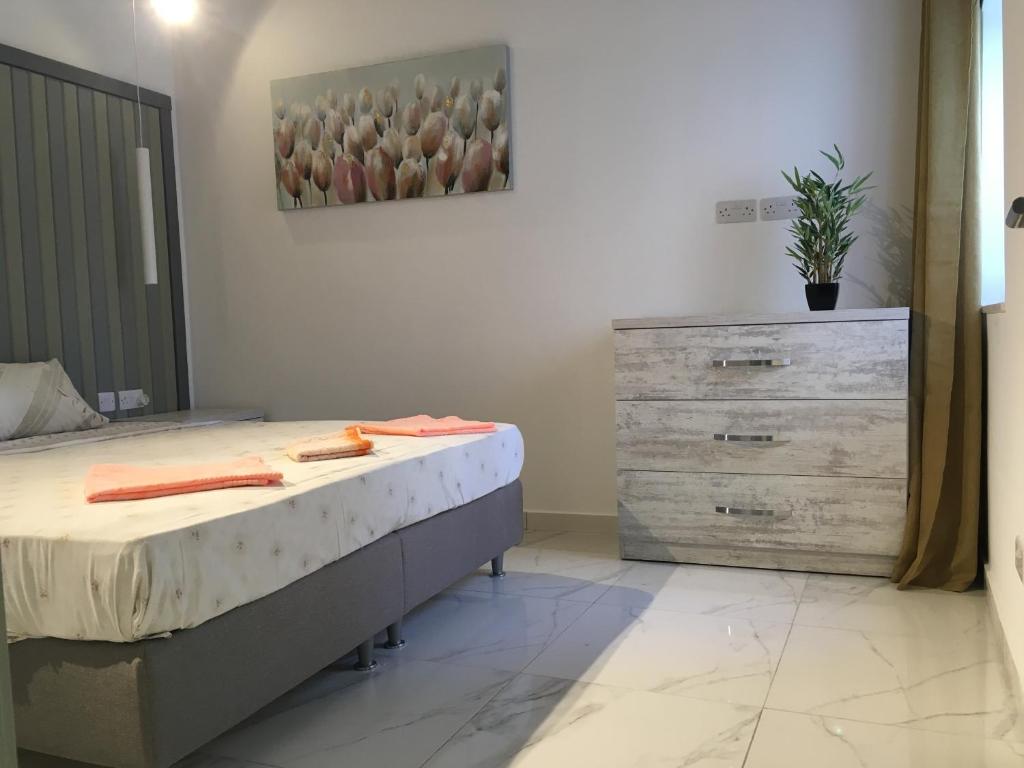 Postel nebo postele na pokoji v ubytování Seaside Room
