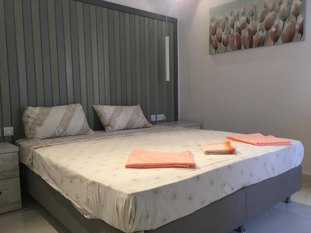 Postel nebo postele na pokoji v ubytování Seaside Room