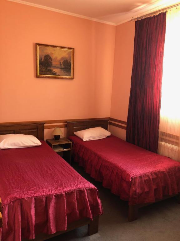 Postel nebo postele na pokoji v ubytování Maestro
