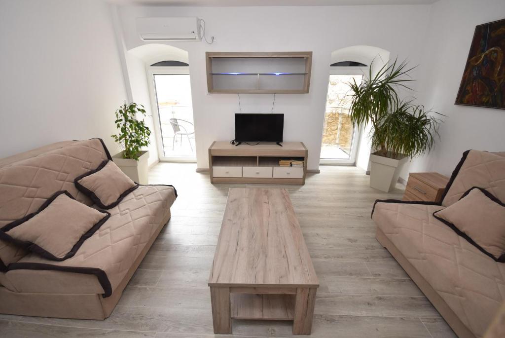 TV a/nebo společenská místnost v ubytování House by The Sea