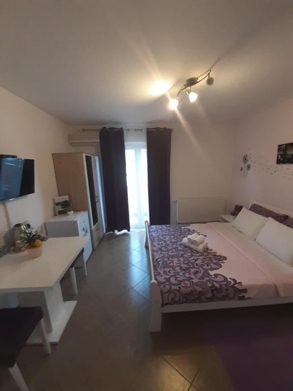 Postel nebo postele na pokoji v ubytování Guest House Mačić