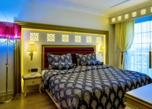 Postel nebo postele na pokoji v ubytování Altın Otel & Spa Balıkesir