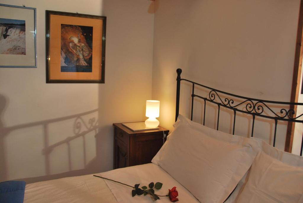Postel nebo postele na pokoji v ubytování B&B Percorso Verde