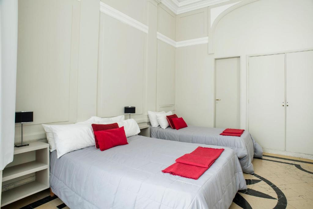 Una cama o camas en una habitación de Patios de Recoleta