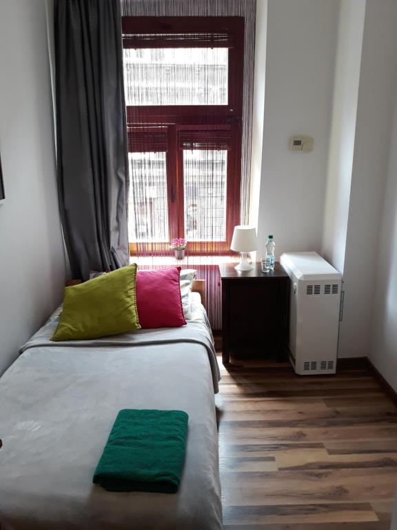 Postel nebo postele na pokoji v ubytování Hostel Gliwice Centrum PARKING