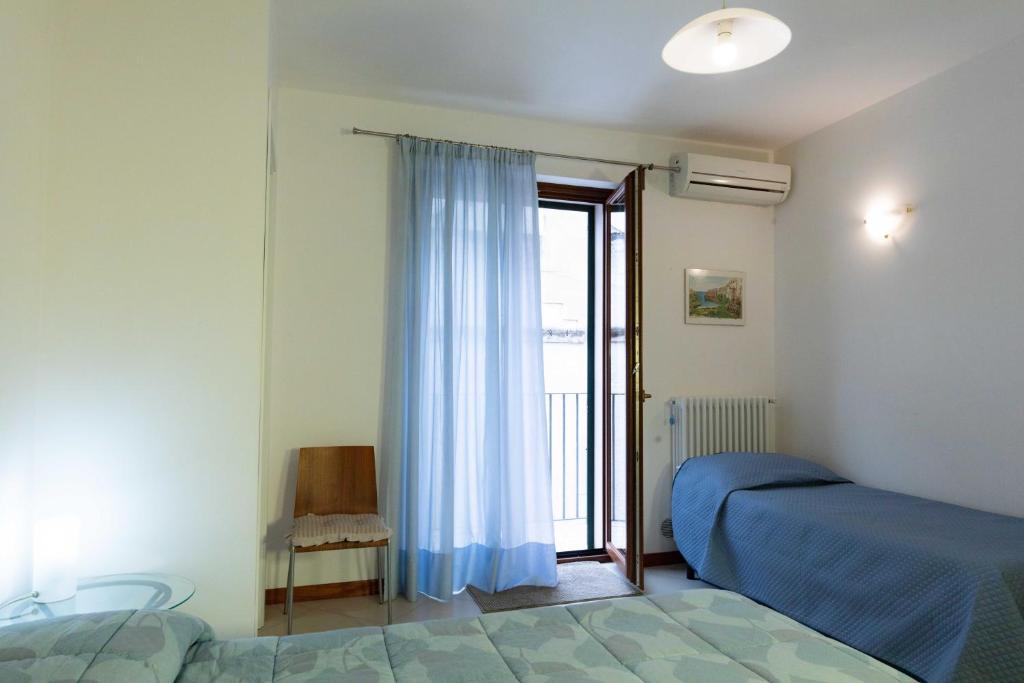 Postel nebo postele na pokoji v ubytování B&B La Stradella