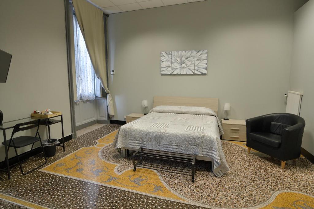 Postel nebo postele na pokoji v ubytování Check-Inn Rooms Genova Centro