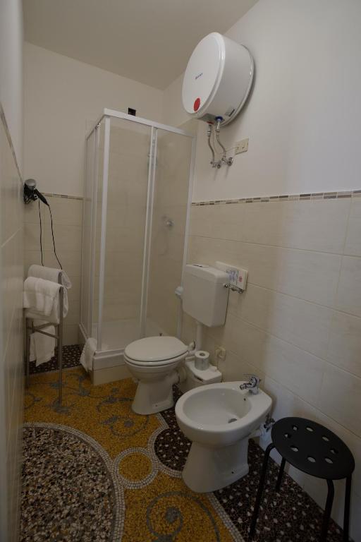 Koupelna v ubytování Check-Inn Rooms Genova Centro