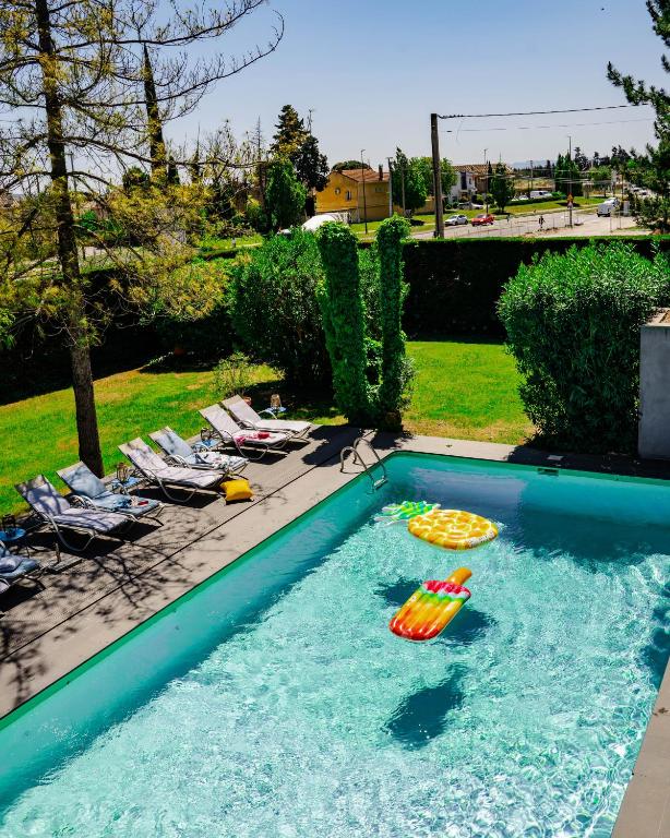Bazén v ubytování Le Safari Hotel Restaurant nebo v jeho okolí