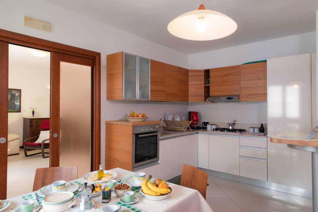 Kuchyň nebo kuchyňský kout v ubytování B&B La Stradella