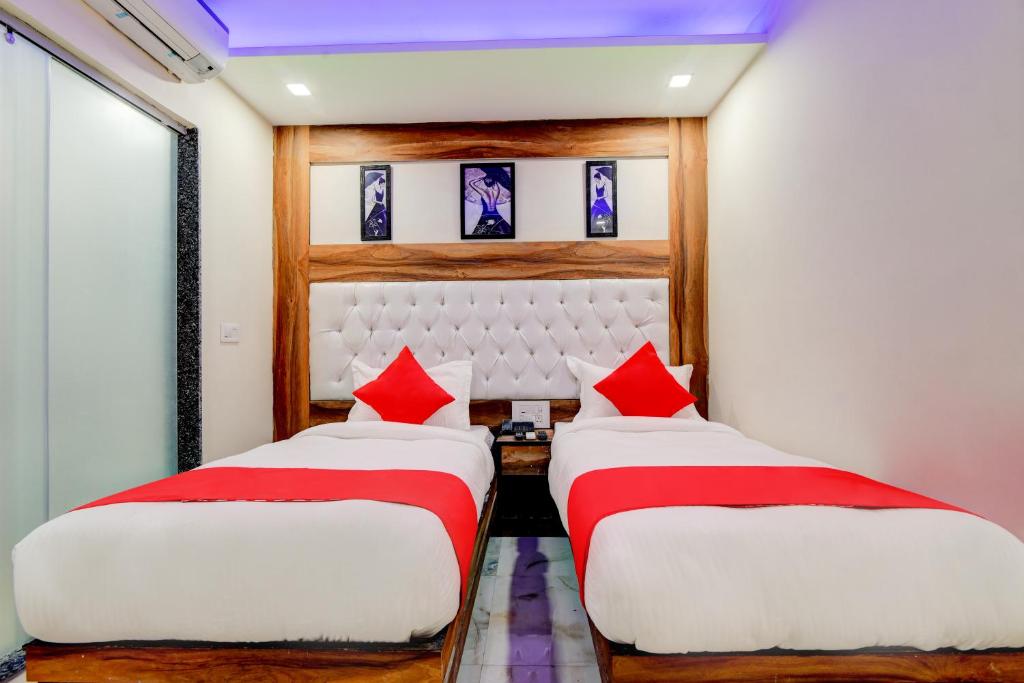 Postel nebo postele na pokoji v ubytování Delhi Guest House at New Delhi Railway Station