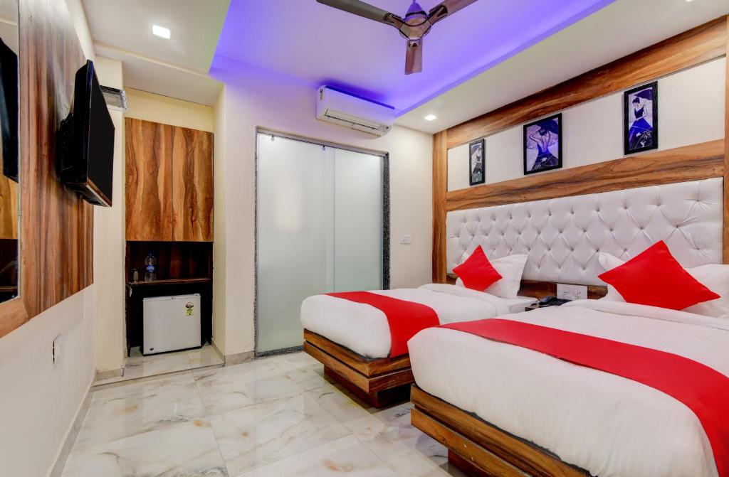 Postel nebo postele na pokoji v ubytování Delhi Guest House at New Delhi Railway Station