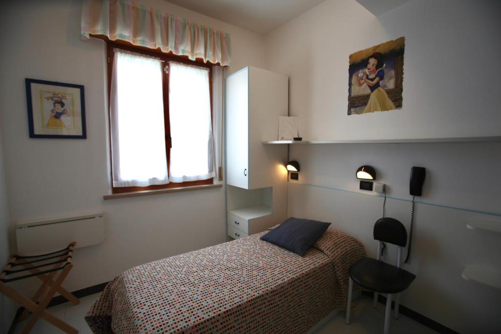 Postel nebo postele na pokoji v ubytování Hotel Biancaneve Wellness