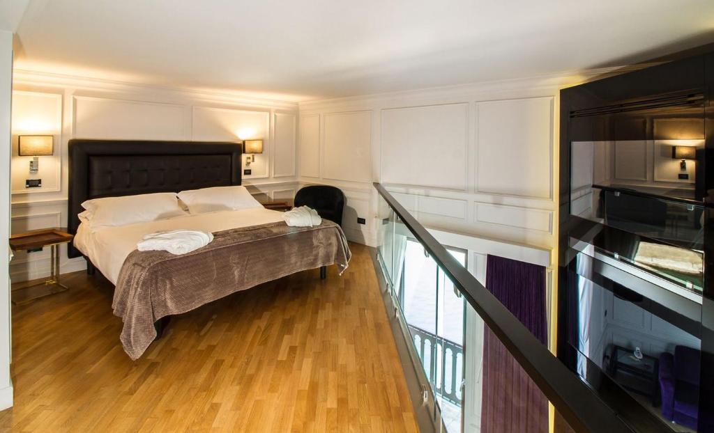 Postel nebo postele na pokoji v ubytování Hotel Europa