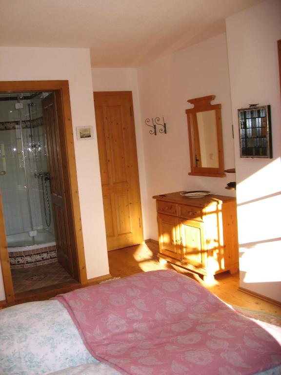 Postel nebo postele na pokoji v ubytování Villa Laske