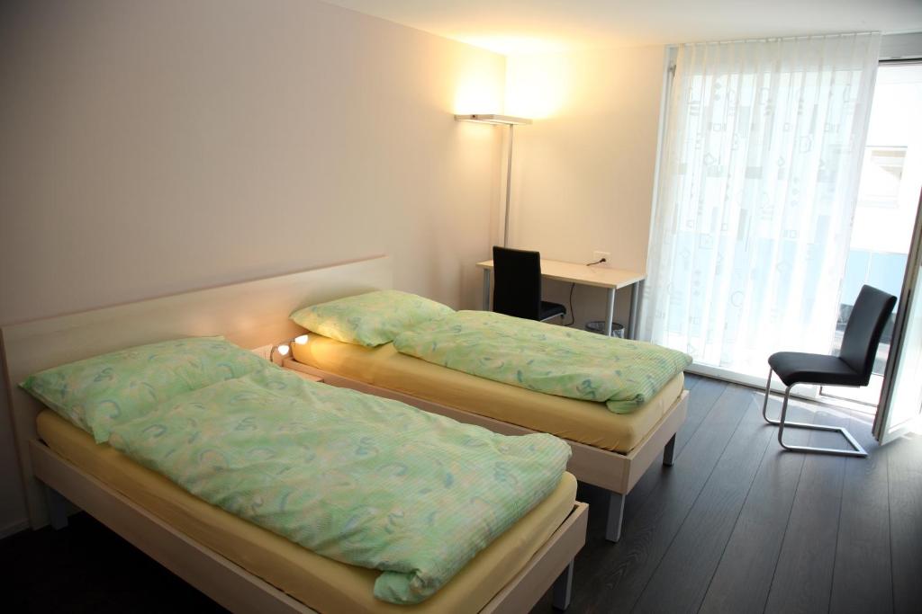 Postel nebo postele na pokoji v ubytování Gasthaus Post