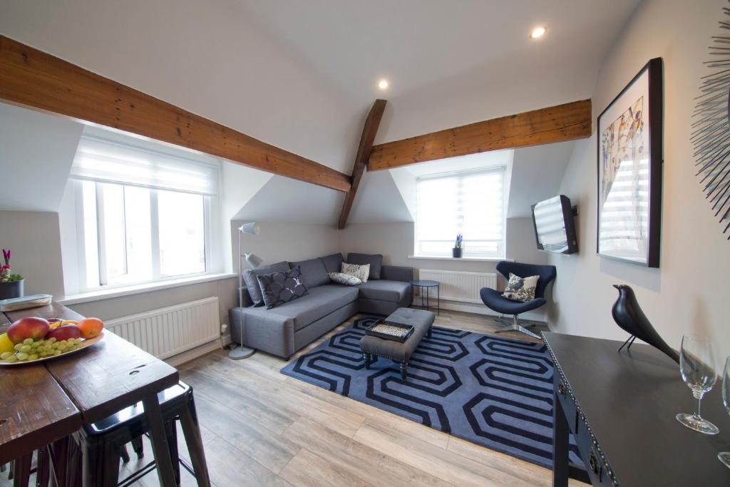 a living room with a couch and a table at Blackbird Luxury Apartments Room 4 in Blackpool