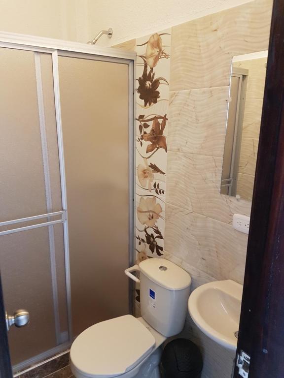 Koupelna v ubytování Hotel Palmari
