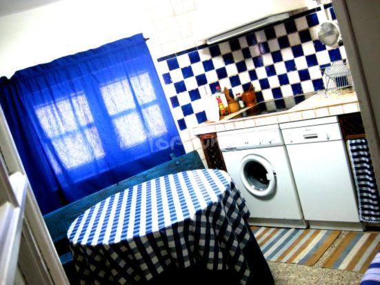 Kuchyň nebo kuchyňský kout v ubytování Casa rural El Rincón