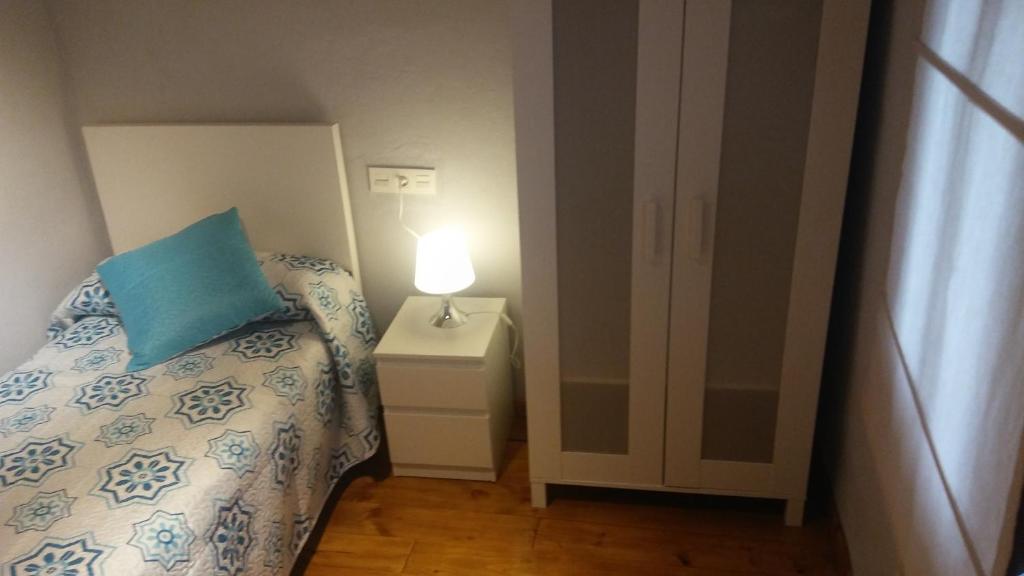 Postel nebo postele na pokoji v ubytování La Casita de la cruz