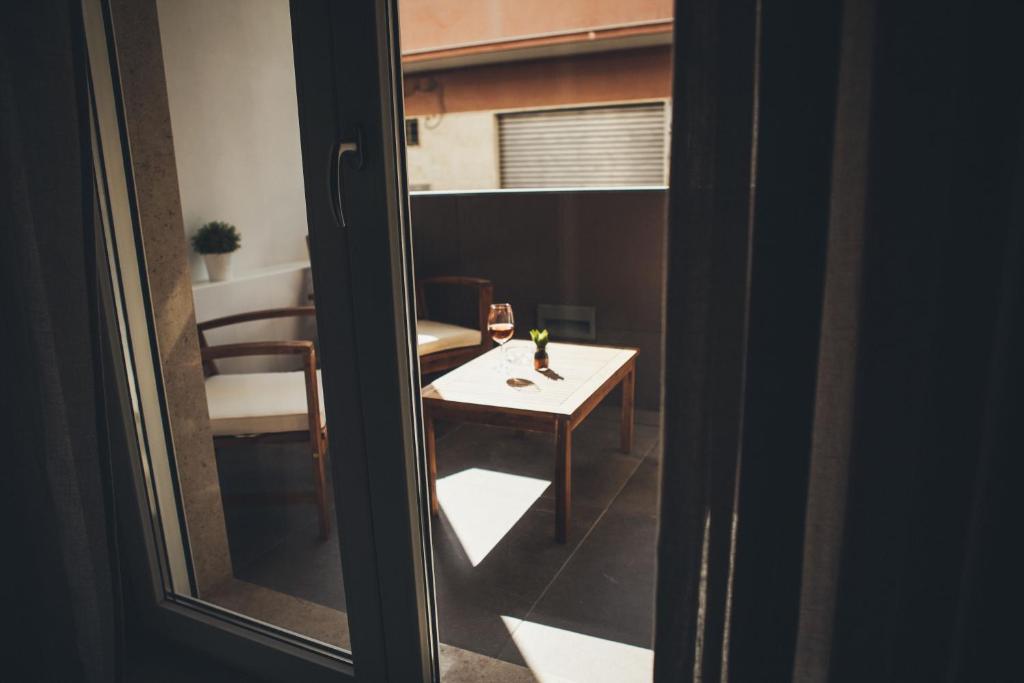 a view of a room with a table and a window at Terradamare in Monopoli