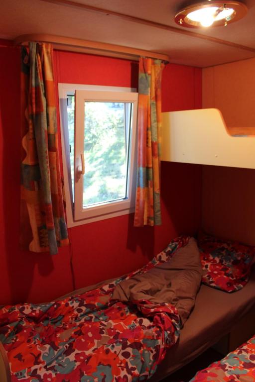 Postel nebo postele na pokoji v ubytování Camping la Chevauchée