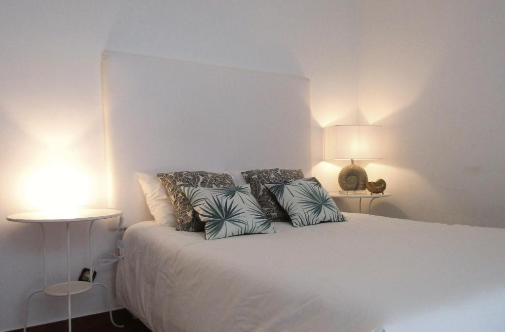 Postel nebo postele na pokoji v ubytování Casa Encantada - Praia da Rocha