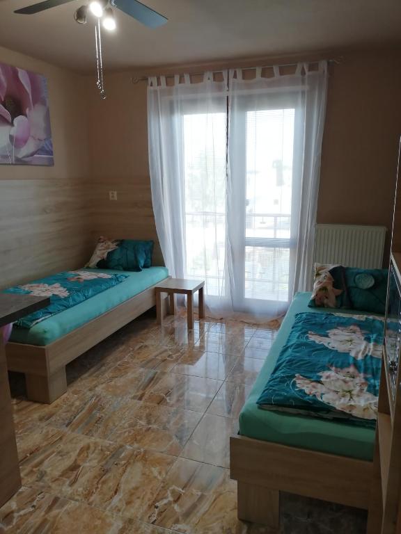 Postel nebo postele na pokoji v ubytování Ubytovani PASO na Palave