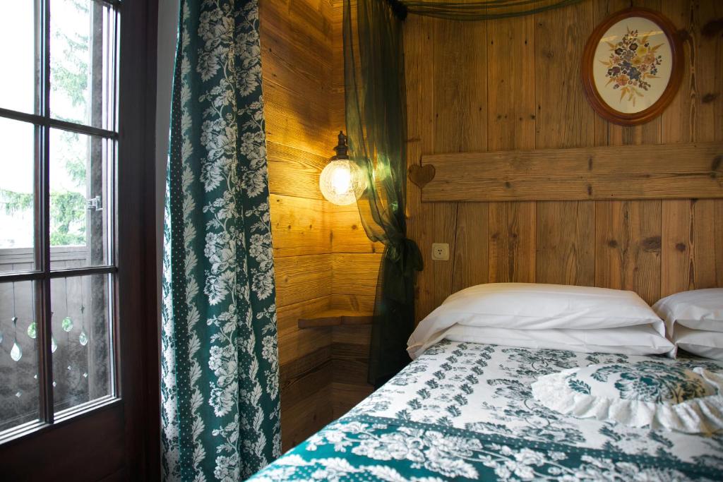Postel nebo postele na pokoji v ubytování Hotel Milleluci