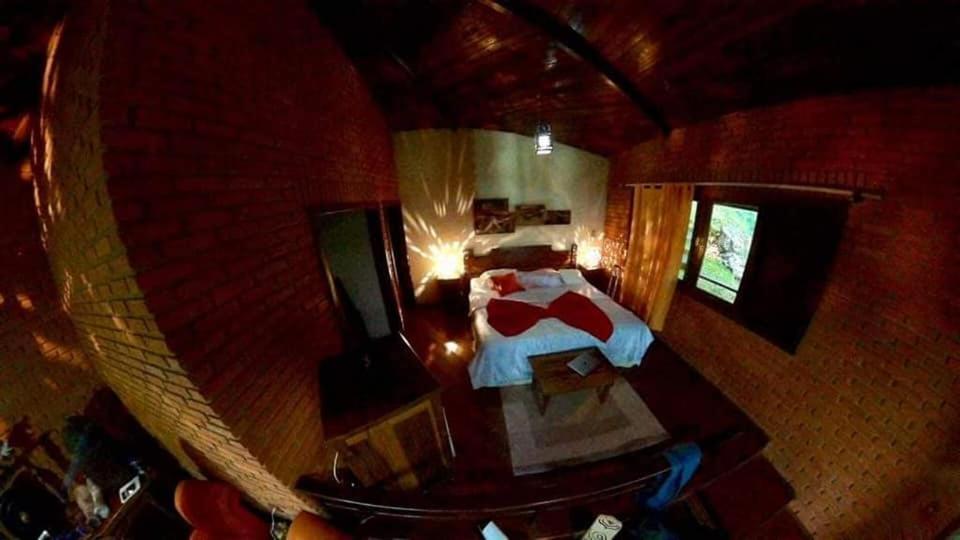 Cama ou camas em um quarto em Vista Linda Hotel