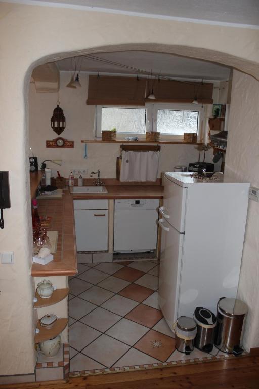 Kuchyň nebo kuchyňský kout v ubytování Ferienwohnung-malanders