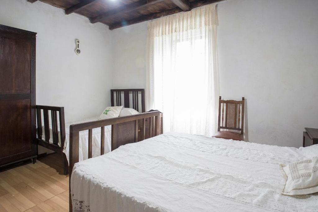 Katil atau katil-katil dalam bilik di A Fonte das Bodas
