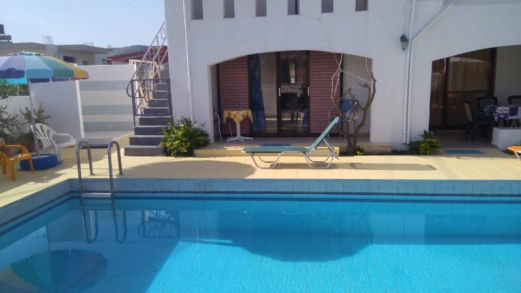 Bazén v ubytování Villas Irene 5 Family Apartments nebo v jeho okolí